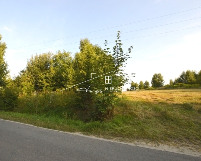 Działka bezpośrednio przy drodze asfaltowej, idealna pod inwestycję.