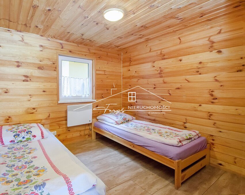 Funkcjonalny budynek gospodarczy na sprzęt i wyposażenie ośrodka.